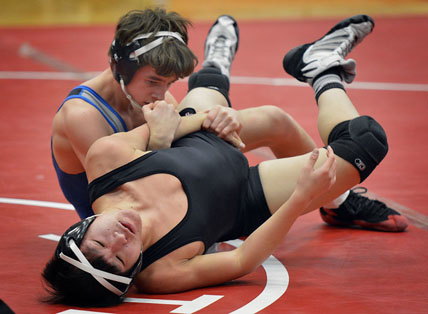 WWT's #119 Chaise Mayer wrestles Lincoln's Tommy Hang. Ray Skowronek--MIPrepZone