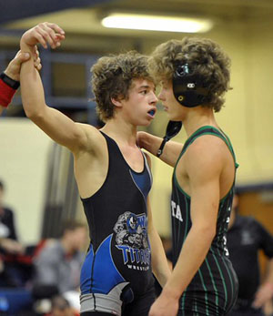 103: Chaise Mayer, Warren Woods-Tower, dec. Justin Tiburcio, Dakota, 15-8. (MIPrepZone photo gallery by David Dalton)